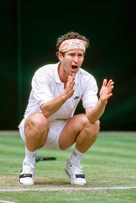 John McEnroe argues with the umpire