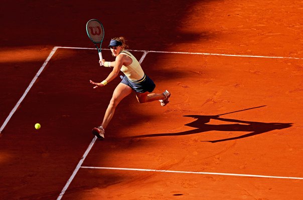 Mirra Andreeva running forehand v Aryna Sabalenka French Open Paris 2024