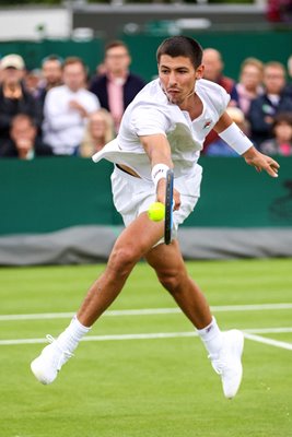 Alexei Popyrin Australia plays a backhand Wimbledon 2024