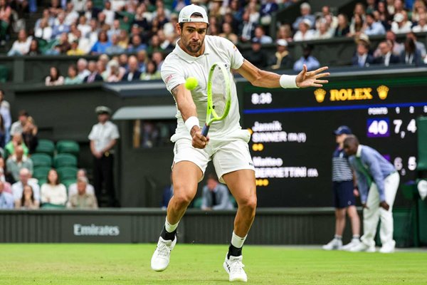 Matteo Berrettini Italy backhand v Jannik Sinner Wimbledon 2024