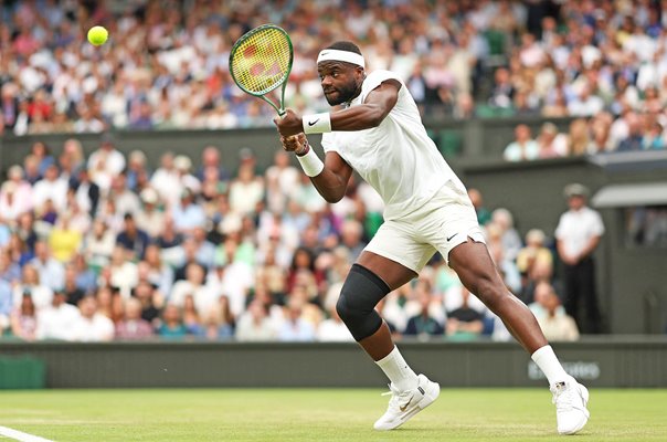 Frances Tiafoe USA backhand v Carlos Alcaraz Spain Wimbledon 2024