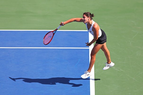 Emma Navarro USA serves v Katerina Siniakova Dubai Tennis Championships 2024