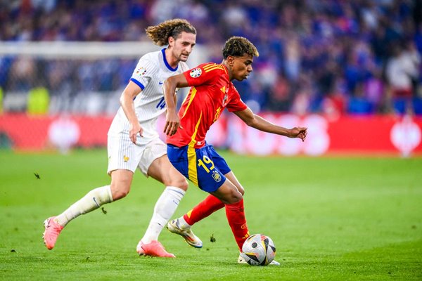 Lamine Yamal Spain under pressure from Adrien Rabiot France Semi-Final EURO 2024