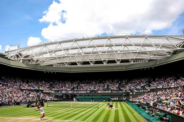 Jasmine Paolini Italy serves v Donna Vekic Semi Final Centre Court Wimbledon 2024