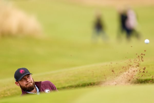 Tyrrell Hatton England plays a bunker shot Day 1 British Open Royal Troon 2024