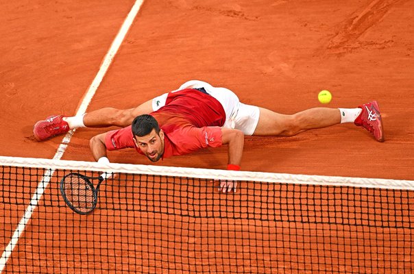 Novak Djokovic Serbia sliding forehand v Francisco Cerundolo French Open Paris 2024