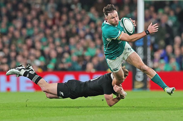 Hugo Keenan Ireland tackled by Damian McKenzie New Zealand Autumn Series Dublin 2024