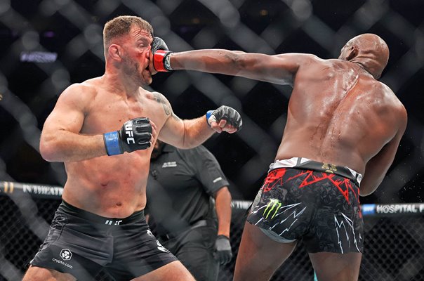 Jon Jones USA punches Stipe Miocic UFC 309 New York 2024