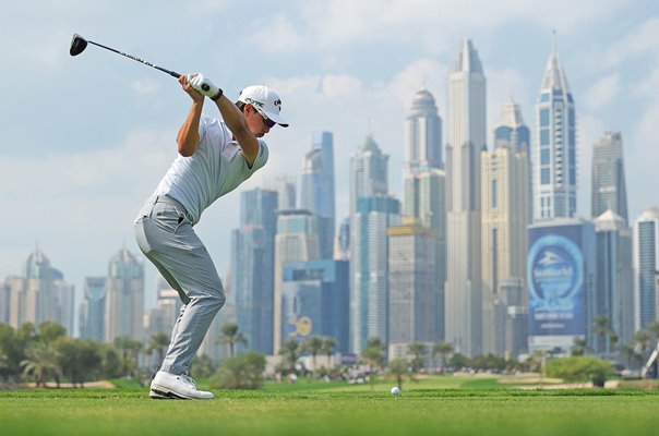 Min Woo Lee Australia drives 8th hole Dubai Desert Classic Emirates Club 2025