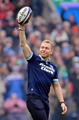 Sir Chris Hoy holds up the match ball Scotland v Ireland Murrayfield Six Nations 2025