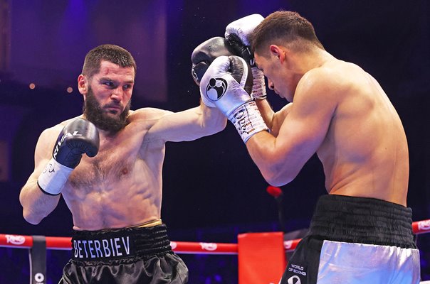 Artur Beterbiev punches Dmitrii Bivol World Light Heavyweight Rematch Riyadh 2025