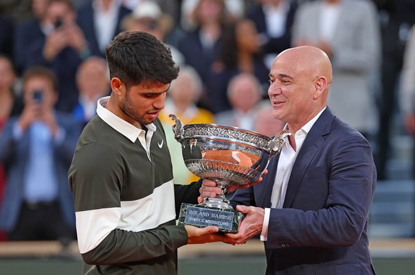 Andre Agassi USA presents trophy to Carlos Alcaraz Spain French Open Paris 2025