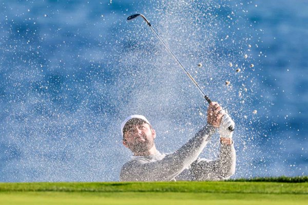 Scottie Scheffler USA bunker shot Pebble Beach Pro-Am 2026
