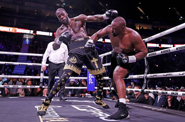 Dereck Chisora lands punch v Deontay Wilder heavyweight classic fight London 2026